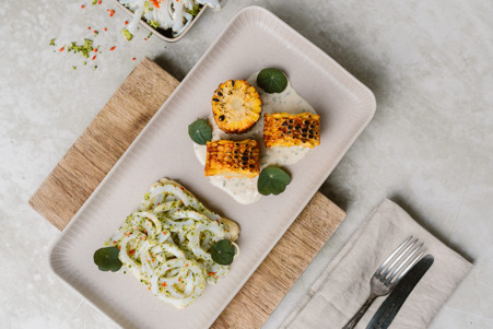 Pijlinktvis met witte bonen creme, broccoli, rode peper en mais